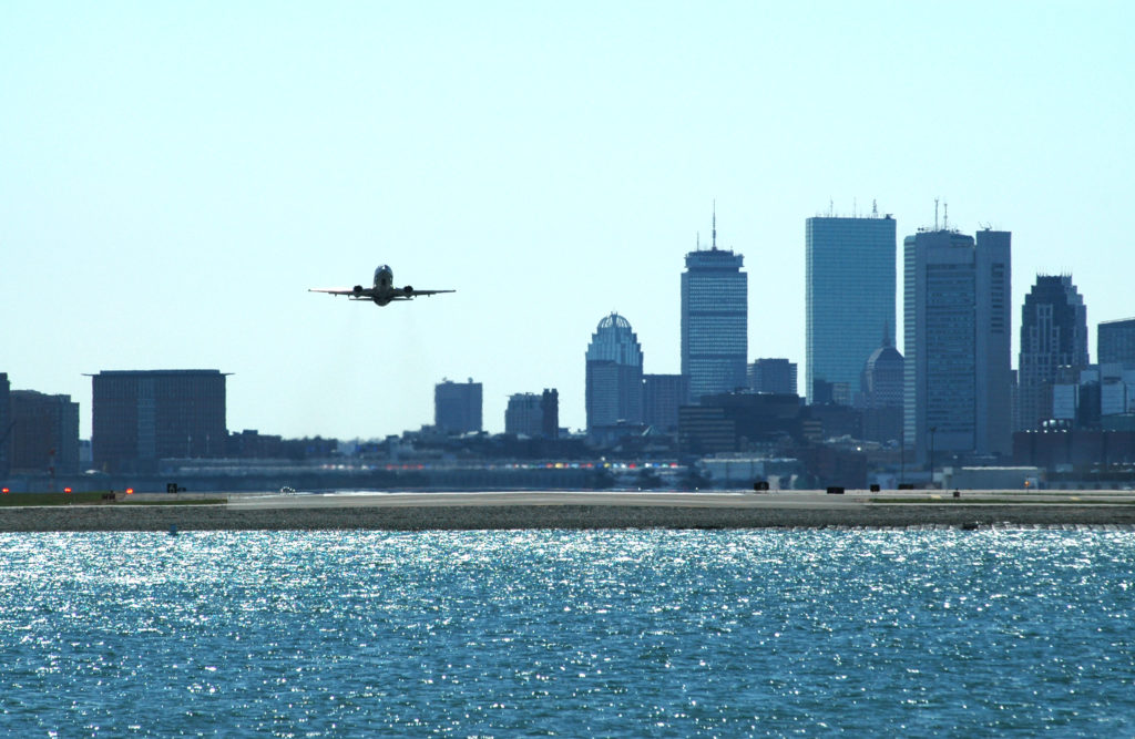 A plane departs Boston Logan International Airport (BOS)