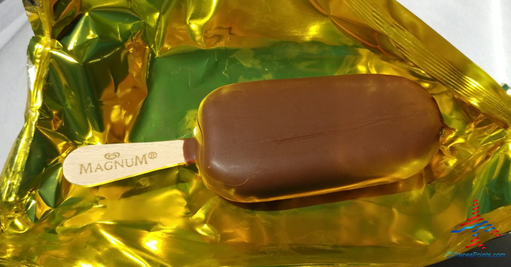 a chocolate covered ice cream bar on a stick