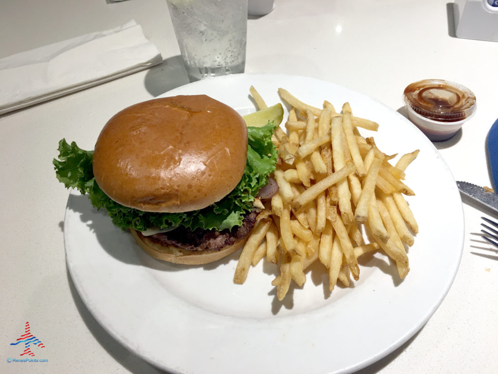 A hamburger and fries are served at Onyx Restaurant inside the Holiday Inn & Suites Anaheim hotel near Disneyland in Anaheim, California.