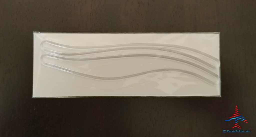 a plastic wrapper with a curved design on a table