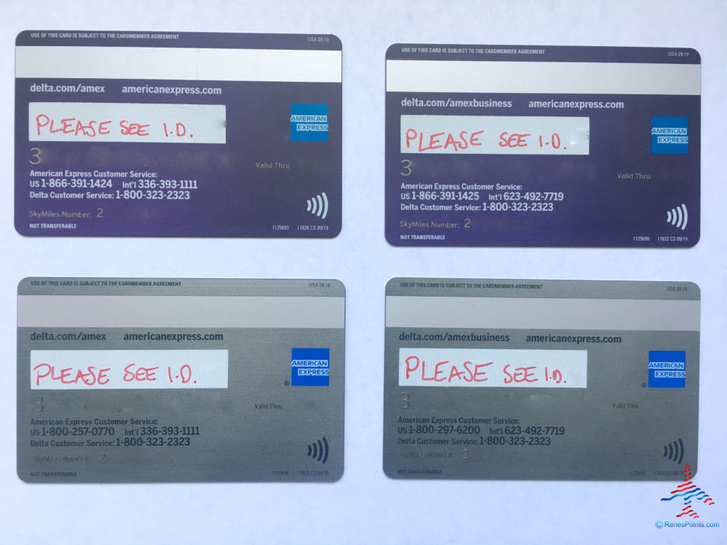 Backs of Delta Air Lines co-branded metal American Express cards.