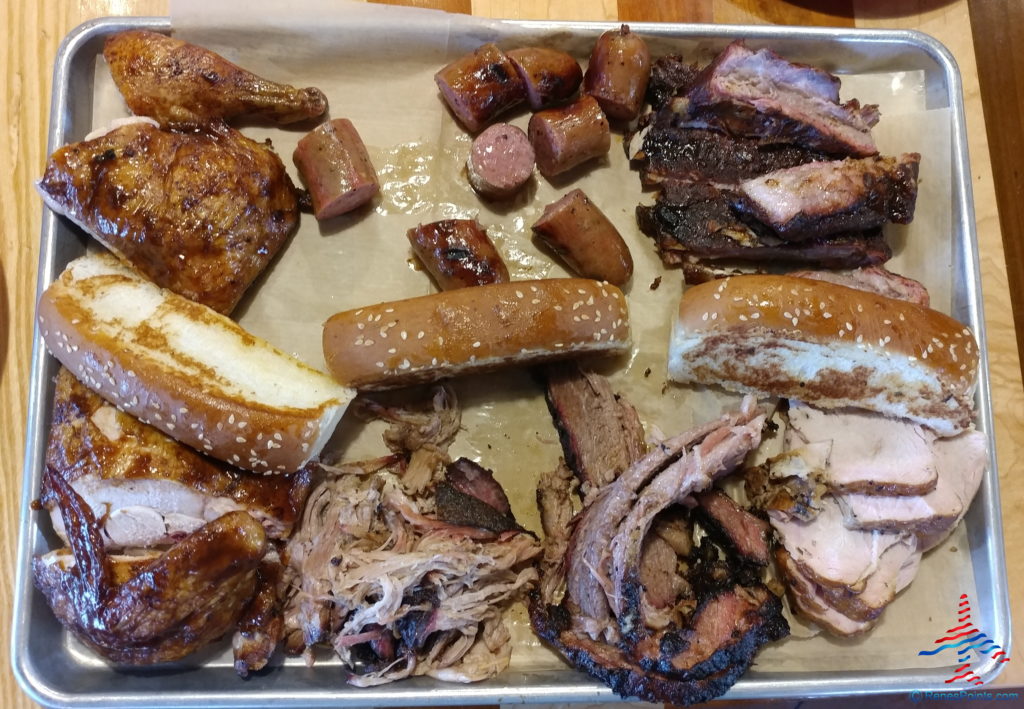 a tray of meat and sausages