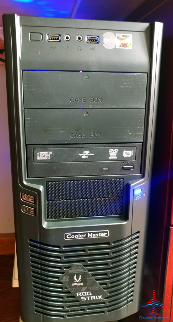 a black computer tower with a blue light
