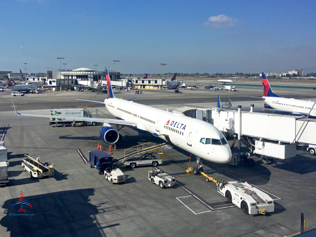 A Delta Air Lines Boeing 757 parks at a Terminal 2 gate at Los Angeles International Airport (LAX).