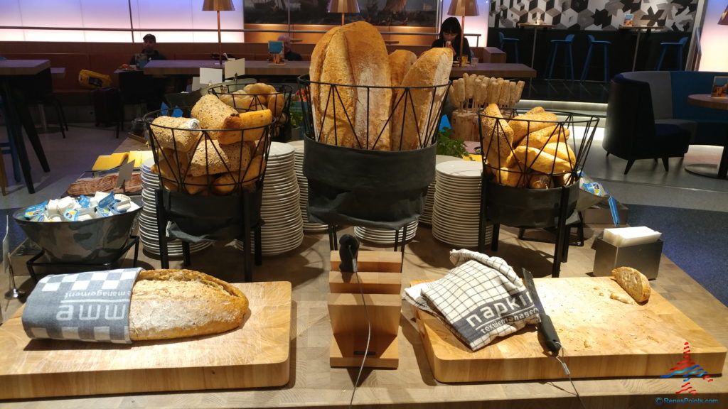 a group of baskets of bread on a table