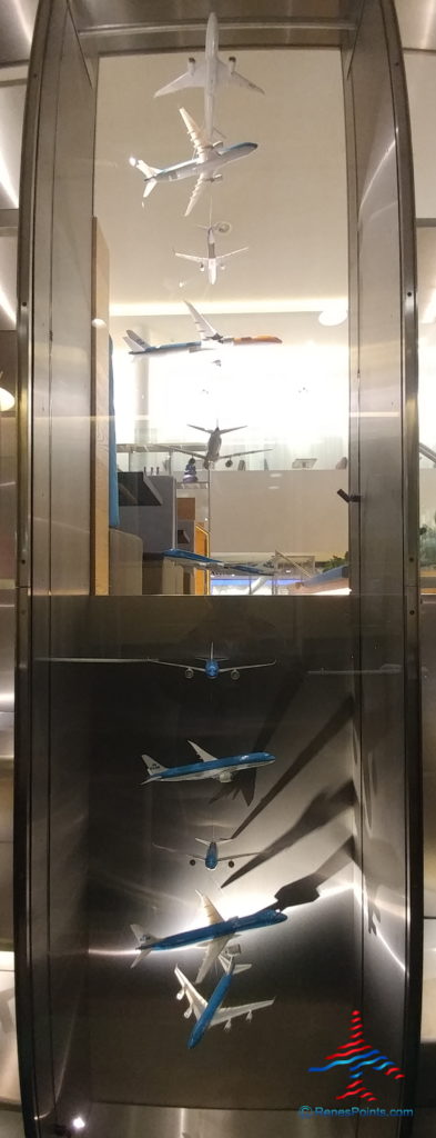 a glass case with airplanes in it