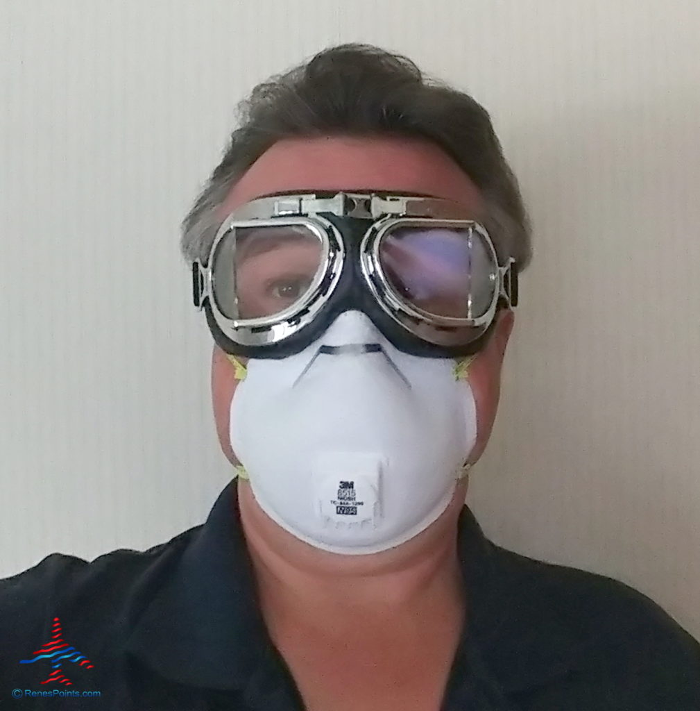a man wearing a mask and goggles
