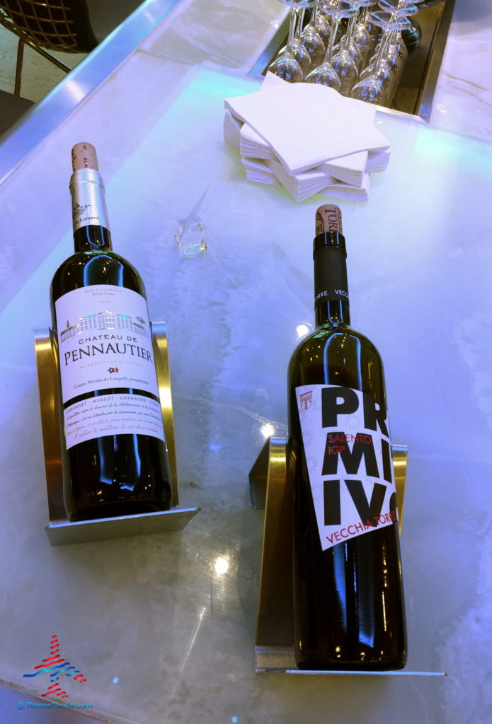 two bottles of wine on a table