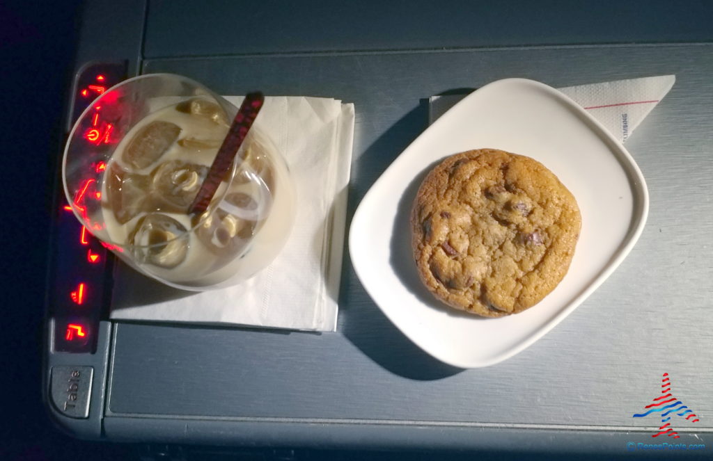 a plate of cookies and a drink