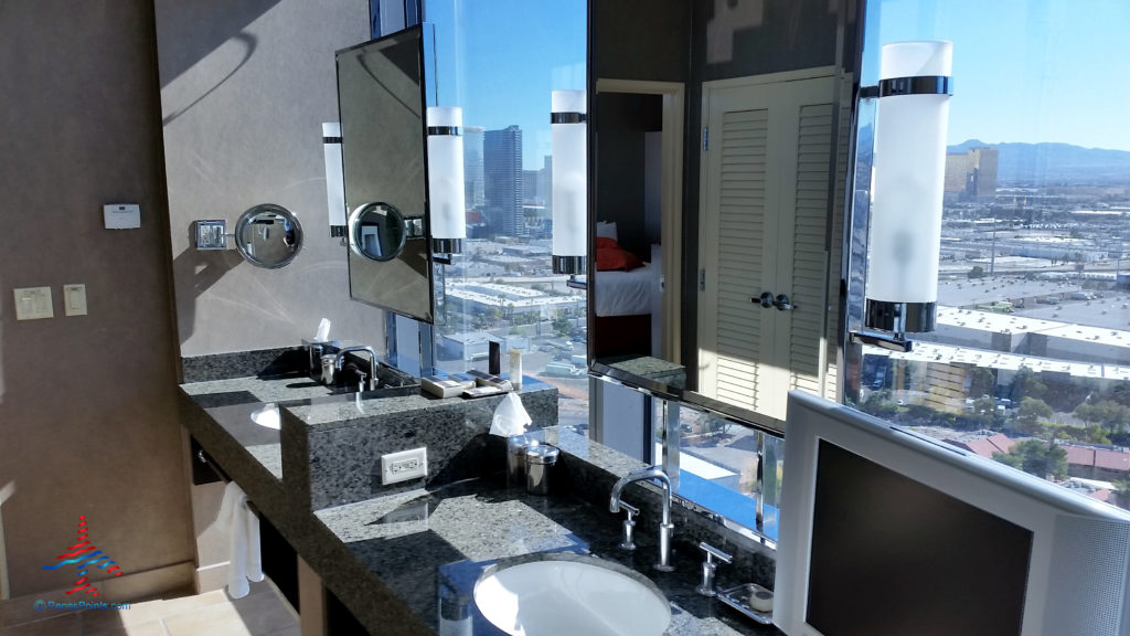 The bathroom looks out toward the Las Vegas Strip from inside a Salon Suite hotel room at Palms Casino Resort in Las Vegas, Nevada.