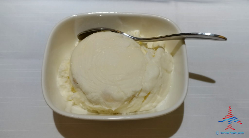 a bowl of ice cream with a spoon