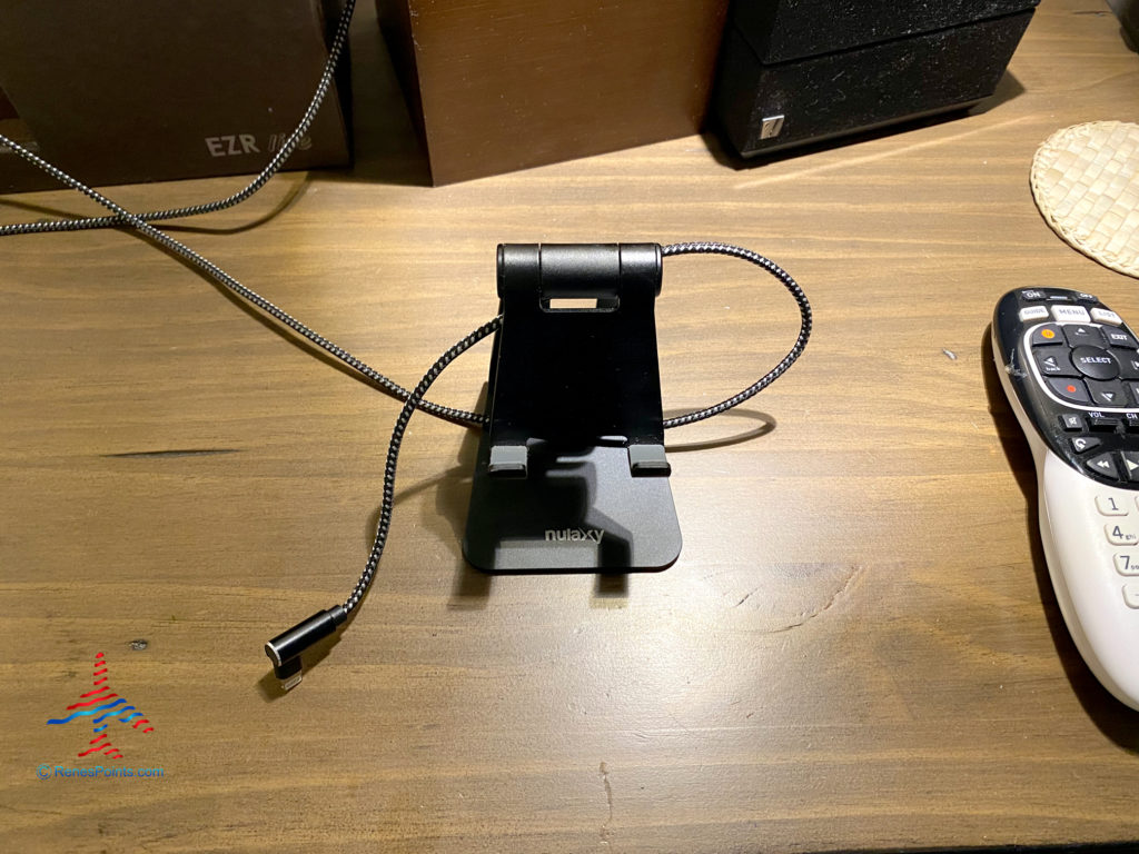 A cell phone stand with USB cable.