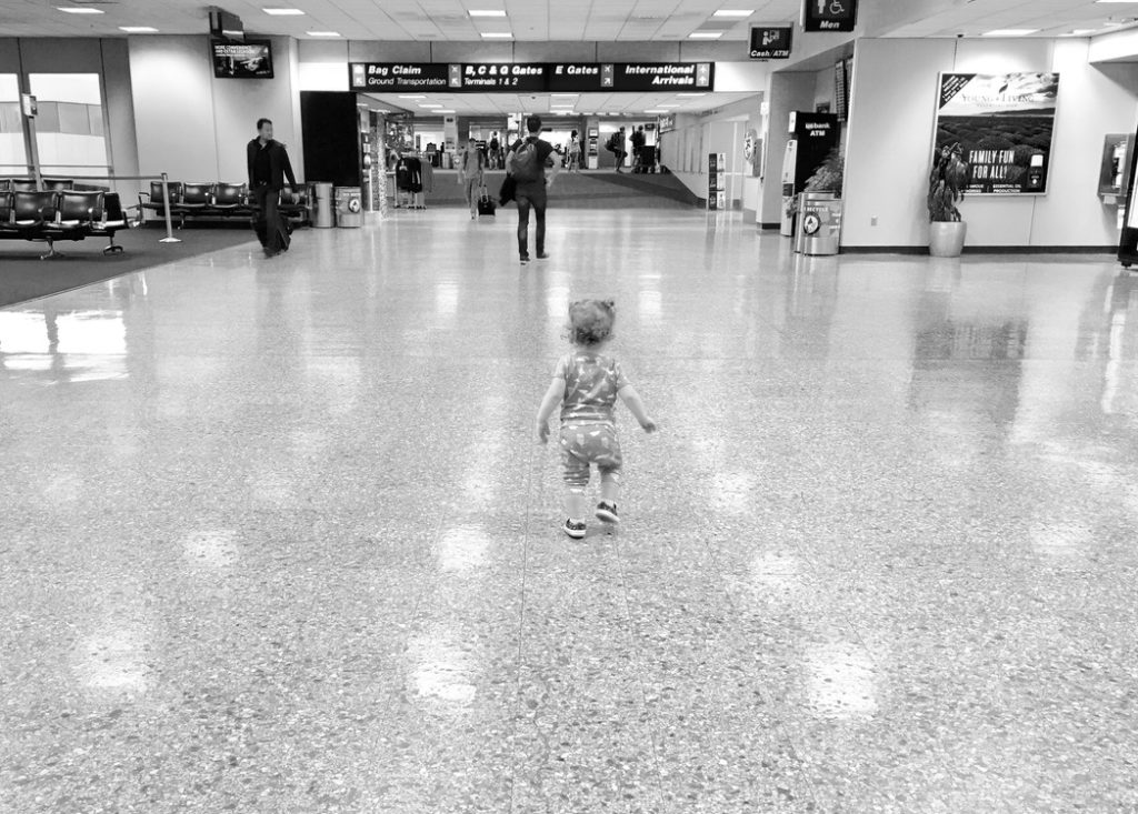 A little girl walks at Salt Lake City International Airport (SLC) in St. Lake City, Utah.