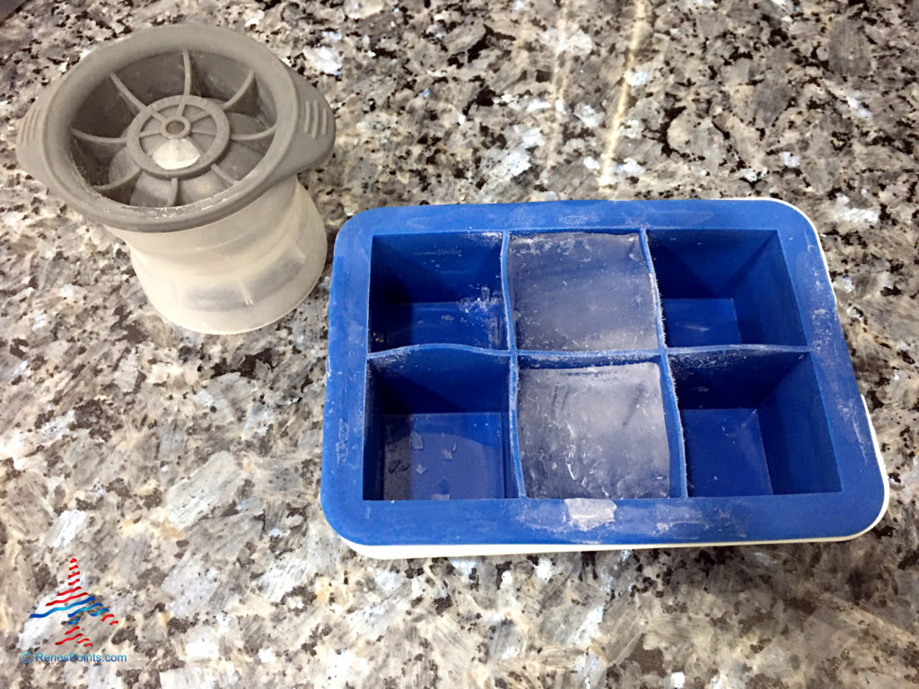 Tovolo ice sphere and OXO ice cube tray.