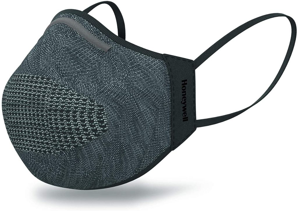 a black face mask with a strap