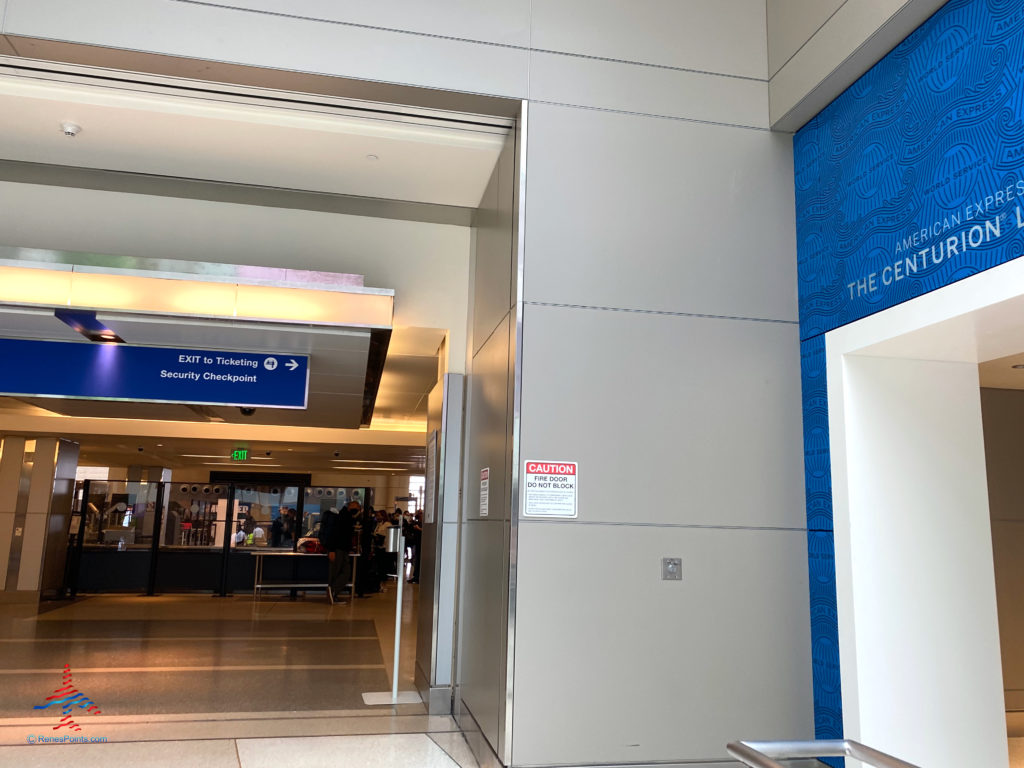 The entrance to the American Express Centurion Lounge LAX inside the Tom Bradley International Terminal (TBIT) at Los Angeles International Airport in Los Angeles, CA, is located near the TBIT security checkpoint. (©Chris Carley/RenesPoints.com)