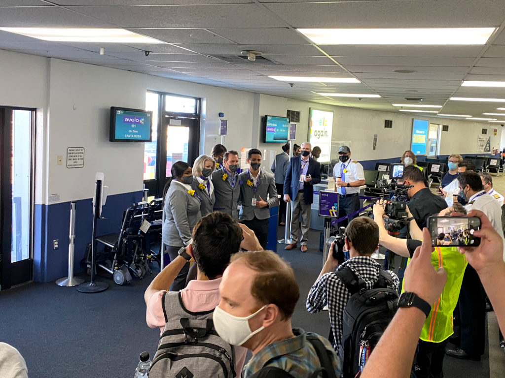 Passengers and guests take photos of flight attendants prior to Avelo Airlines’ first passenger flight, XP101. The trip traveled from Hollywood Burbank Airport in Burbank, California (BUR) to Charles M. Schulz–Sonoma County Airport in Santa Rosa, California (STS) on Wednesday, April 28, 2021.