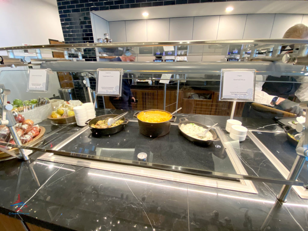 Chimichurri chicken, vegetable curry, and basmati rice are seen on the buffet inside the dining area during a visit to American Express’ The Centurion Lounge - Las Vegas airport club lounge at Las Vegas International Airport (LAS) in Las Vegas, Nevada.