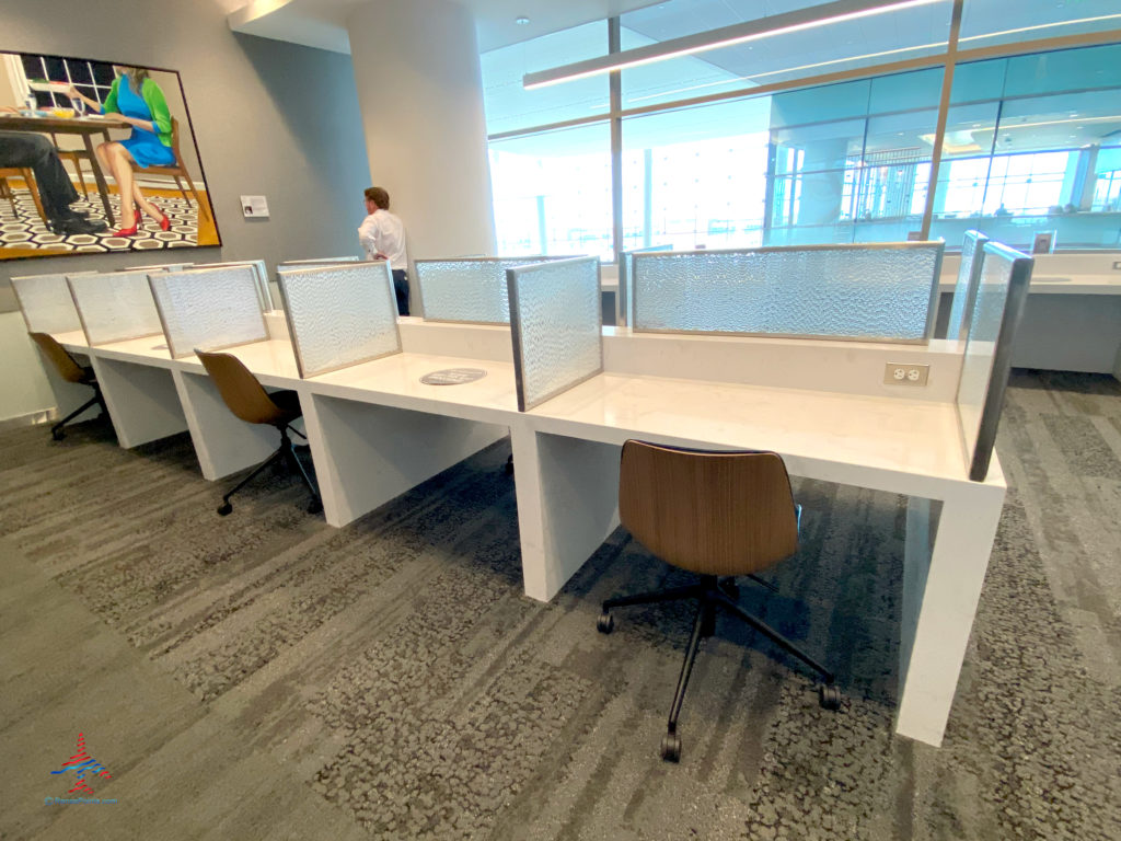 Work cubicles are seen during a visit to the Delta Sky Club Salt Lake City inside Terminal A of Salt Lake City International Airport (SLC). (Photo ©RenesPoints.com)
