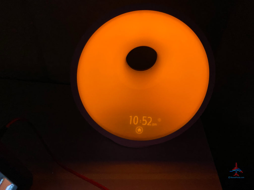 a round orange light with a black circle