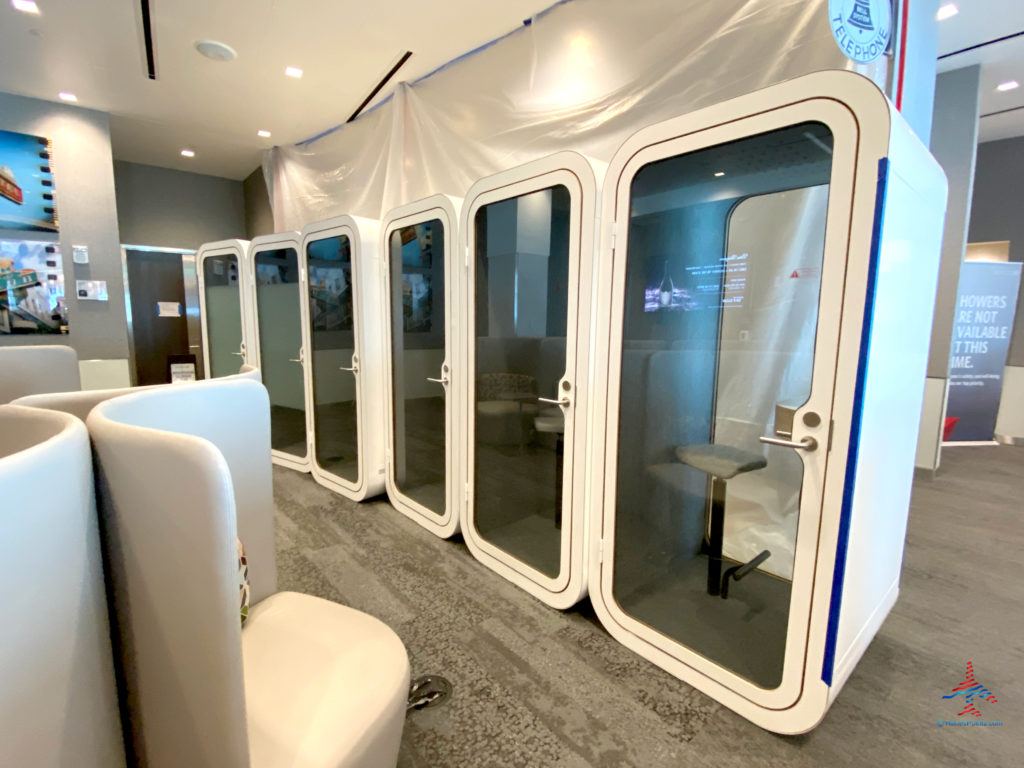 A row of cell phone booths are seen during a visit to the Delta Sky Club Salt Lake City inside Terminal A of Salt Lake City International Airport (SLC). (Photo ©RenesPoints.com)
