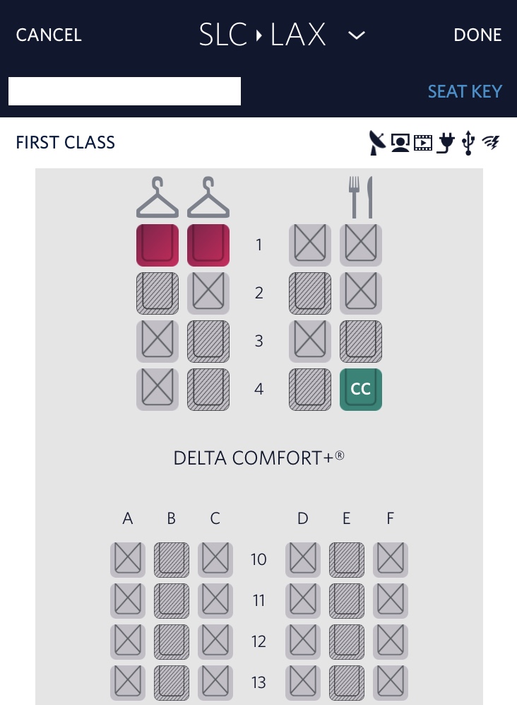 First class with an open adjacent seat on a Delta flight from Salt Lake City to Los Angeles.