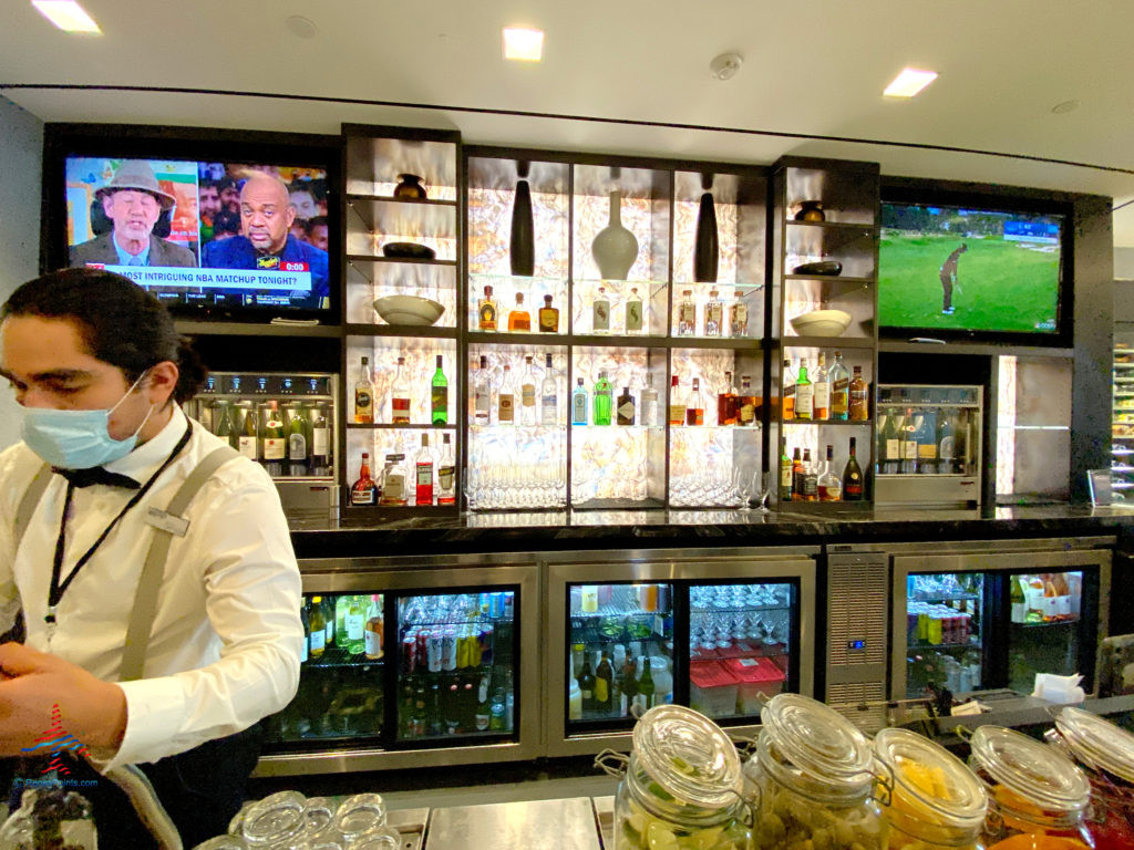 A full service bar is seen during a visit to the Delta Sky Club Salt Lake City inside Terminal A of Salt Lake City International Airport (SLC). (Photo ©RenesPoints.com)