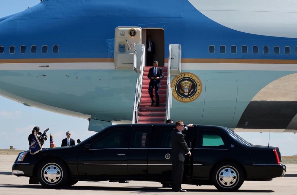 Jonathan Wackrow -- then a US Secret Service agent -- stands guard outside Air Force One and awaits President Barack Obama.