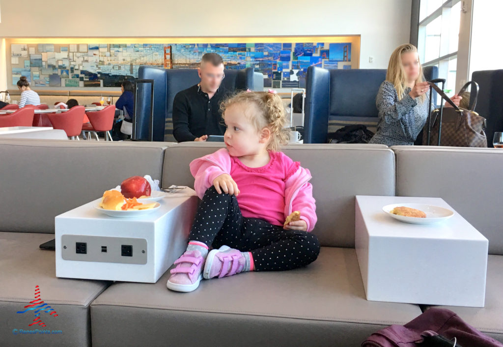 My daughter at the SFO Sky Club earlier this year.
