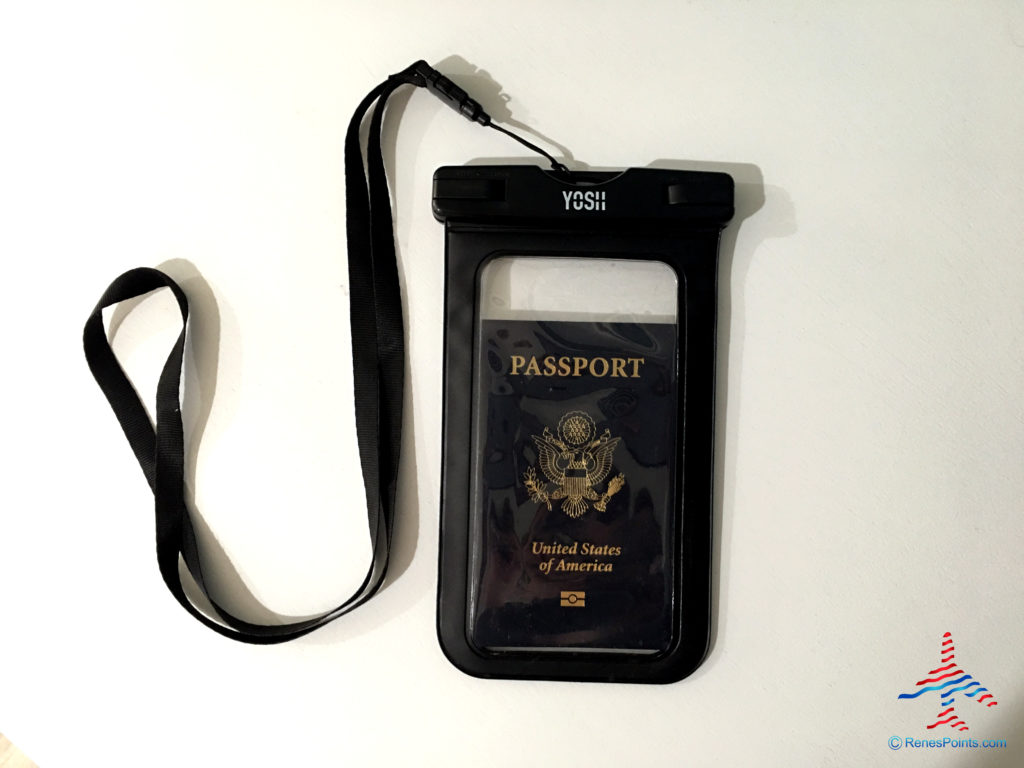 A United States passport is protected by a YOSH waterproof cell phone case / pouch.